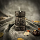 Egyptian pillar candle spell kit featuring Anubis and Horus figures, used for protection and divine guidance, by Parlour of Wonders.