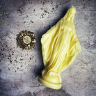 Parlour of Wonders Queen of Heaven Candle Spell Kit featuring yellow candle, divine symbols, and spiritual tools for love magic.