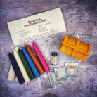 Parlour of Wonders Seven Treasures Candle Spell Kit with yellow candles for unlocking blessings and abundance.