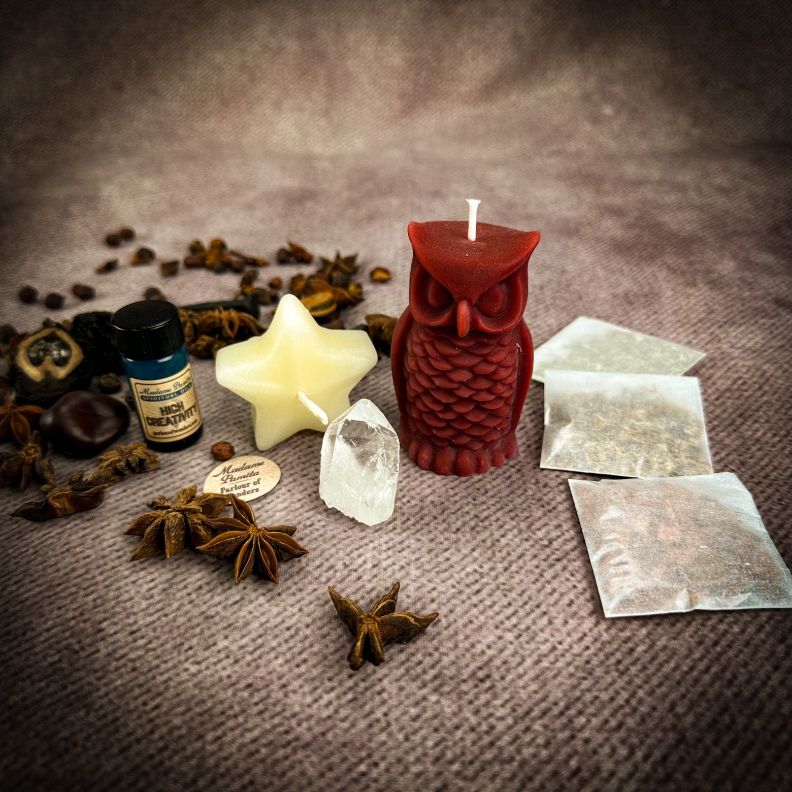 Wise Owl Candle Spell Kit by Parlour of Wonders featuring a yellow candle and wishing star for wisdom and success.