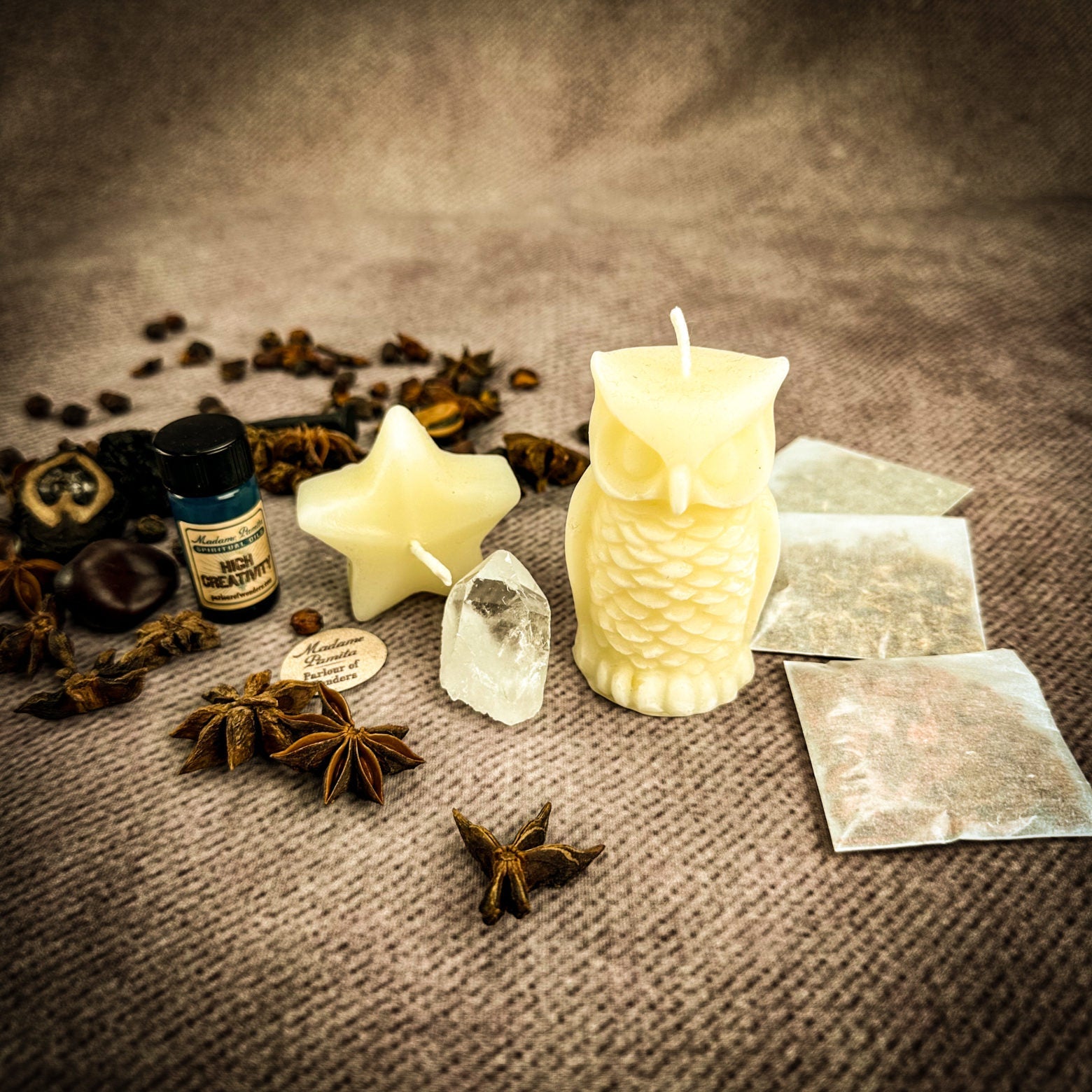 Wise Owl Wishing Star Candle Spell Kit by Parlour of Wonders, yellow candle with star and owl design for wisdom and success.