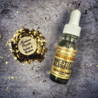 Bountiful Blessings Oil by Madame Pamita from Parlour of Wonders, featuring a glass bottle with golden oil and a decorative label.