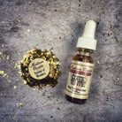 Come to Me Oil by Madame Pamita from Parlour of Wonders, featuring a small amber bottle with a dropper cap.