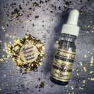 Bottle of Domination Oil by Madame Pamita from Parlour of Wonders, featuring dark amber glass with a label and dropper cap.