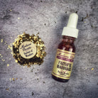 Bottle of Faithful Marriage Oil by Madame Pamita from Parlour of Wonders, featuring a decorative label and dark glass container.
