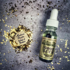 Bottle of Good Luck Oil by Madame Pamita from Parlour of Wonders, featuring a dark glass container with a label and decorative elements.