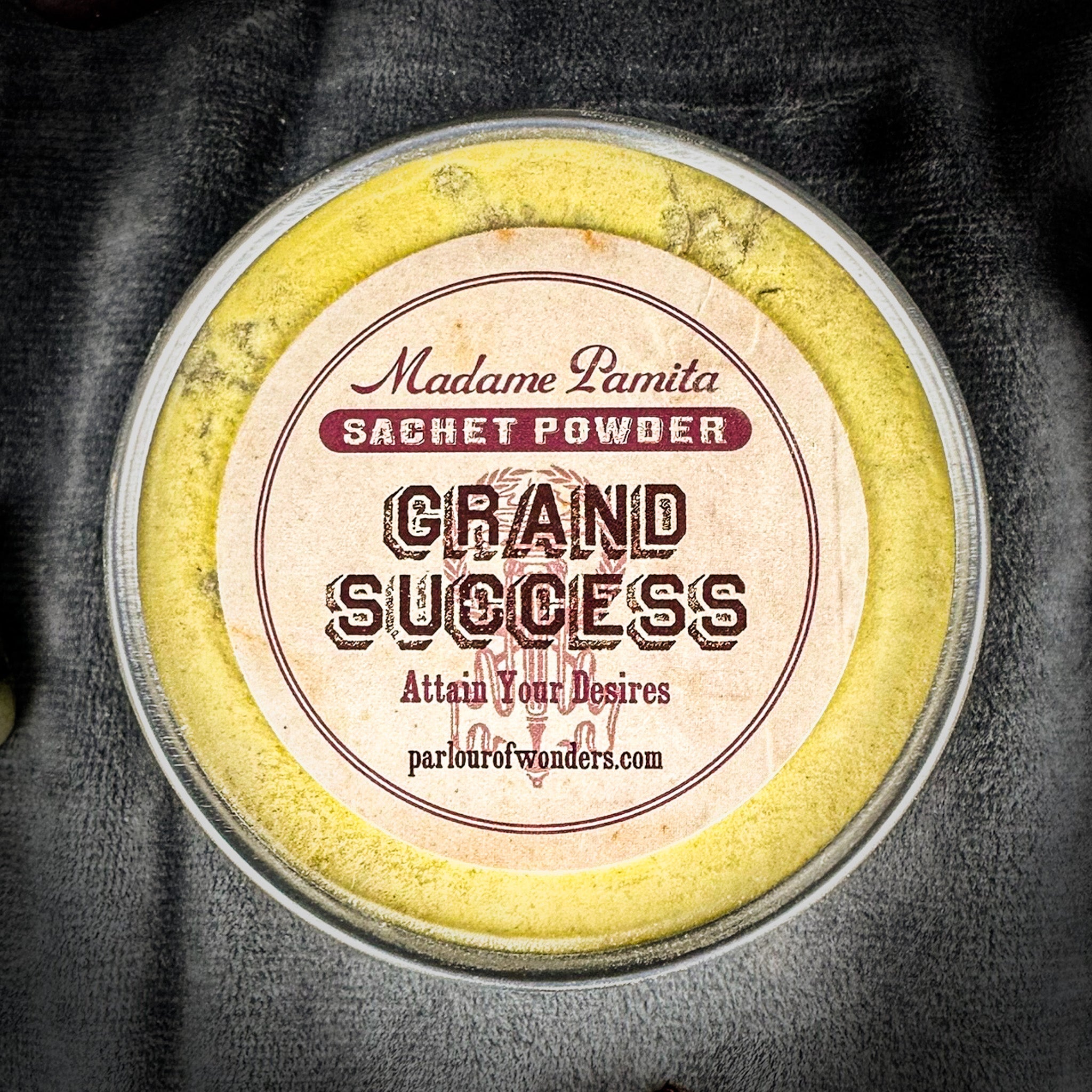 Grand Success Sachet Powder by Madame Pamita, shown in a small herbal sachet used for spiritual and ritual purposes.