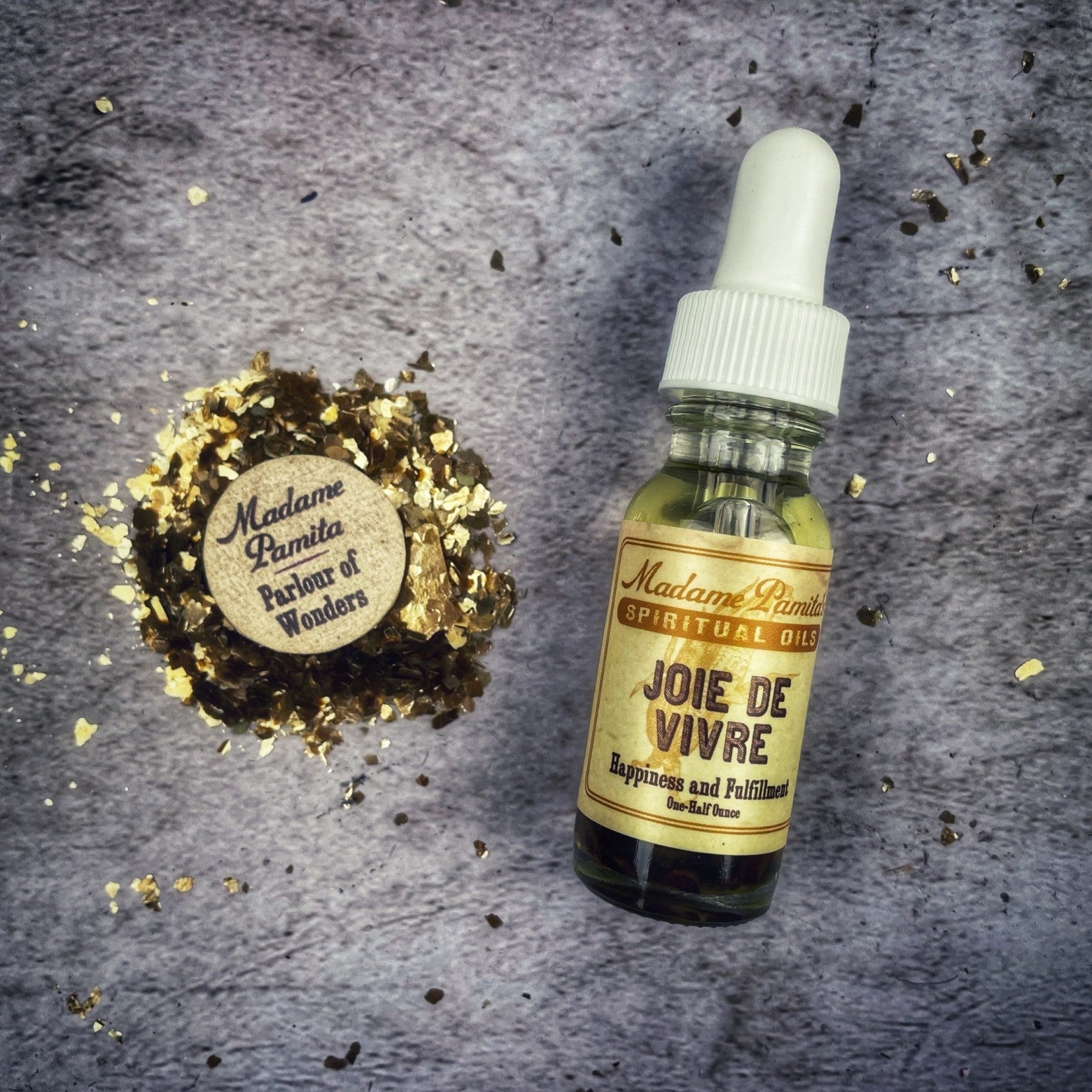 Joie De Vivre Oil by Madame Pamita from Parlour of Wonders, featuring a bottle with elegant label and natural herbal ingredients.