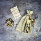 Love Potion No. 9 Spell Kit by Parlour of Wonders featuring potion bottles, spell ingredients, and mystical packaging.