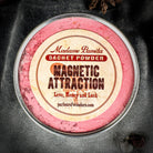 Magnetic Attraction Sachet Powder by Madame Pamita for Parlour of Wonders, featuring a small glass jar with black powder and label.