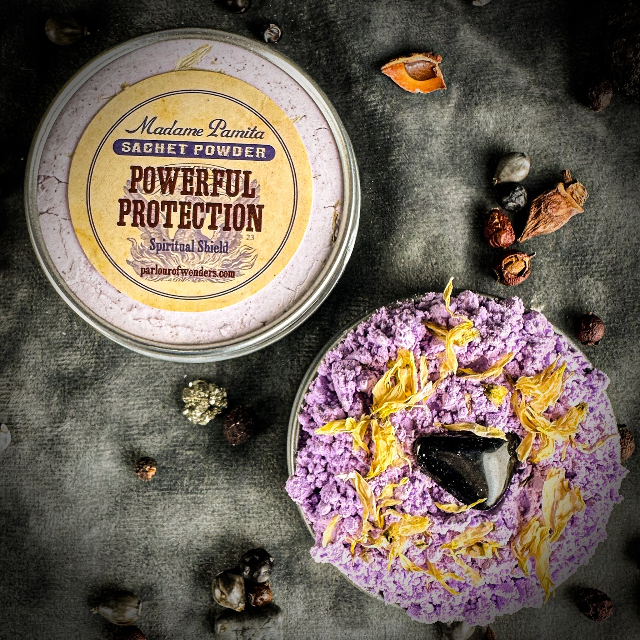 Powder sachet by Madame Pamita for powerful protection, featuring herbal ingredients in a small decorative pouch.