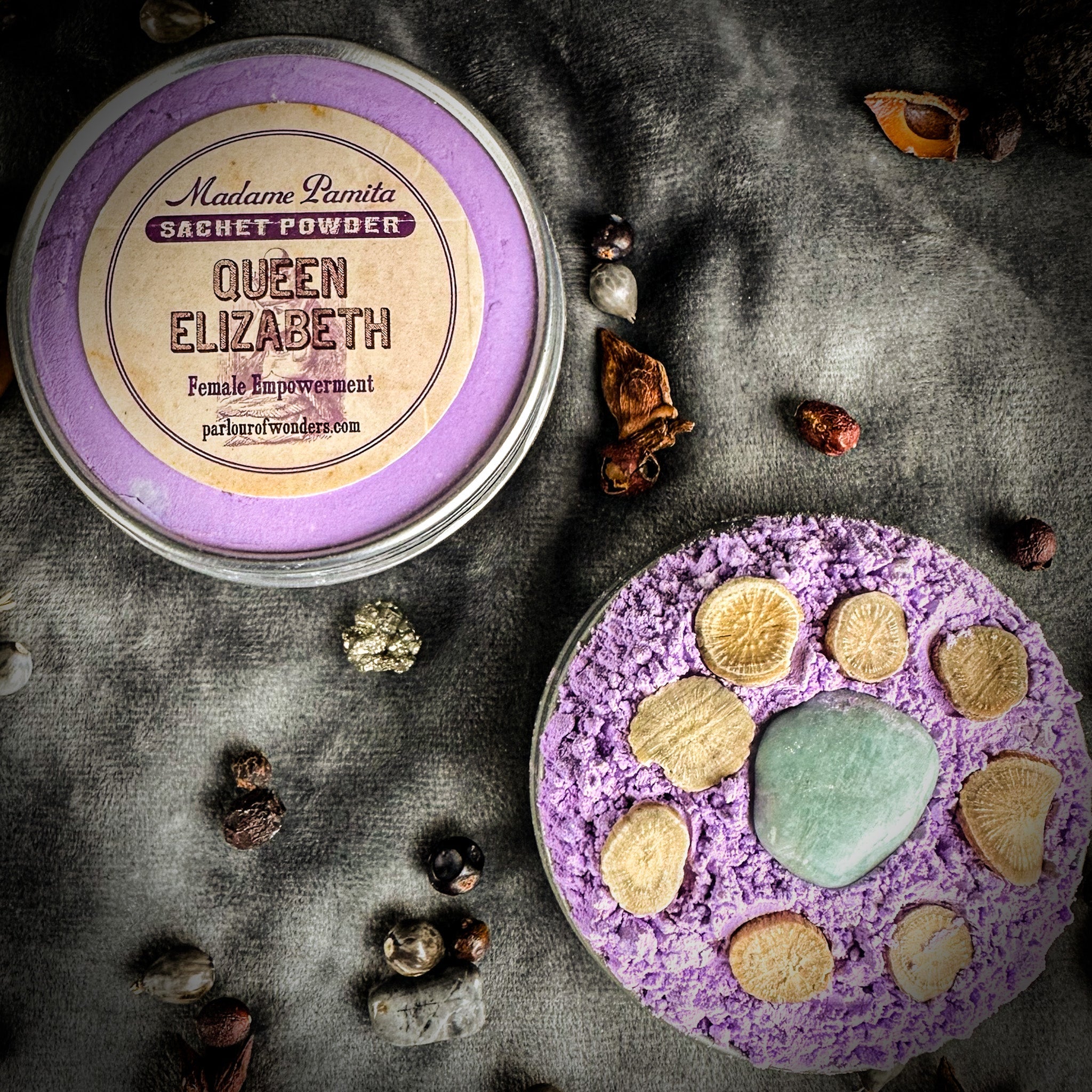 Queen Elizabeth Sachet Powder by Madame Pamita from Parlour of Wonders, shown in a decorative sachet with intricate design.