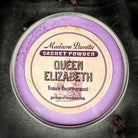 Queen Elizabeth Sachet Powder by Madame Pamita from Parlour of Wonders, featuring a vintage-inspired sachet with decorative design.