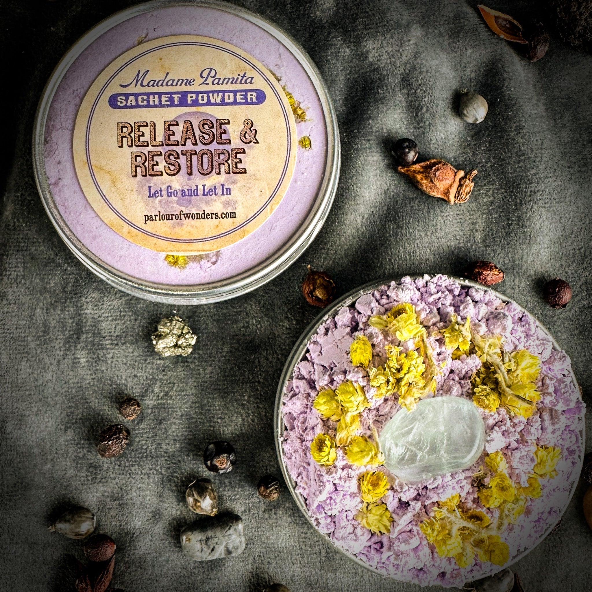 Parlour of Wonders Release and Restore Sachet Powder by Madame Pamita, displayed in a small sachet packet with decorative design.