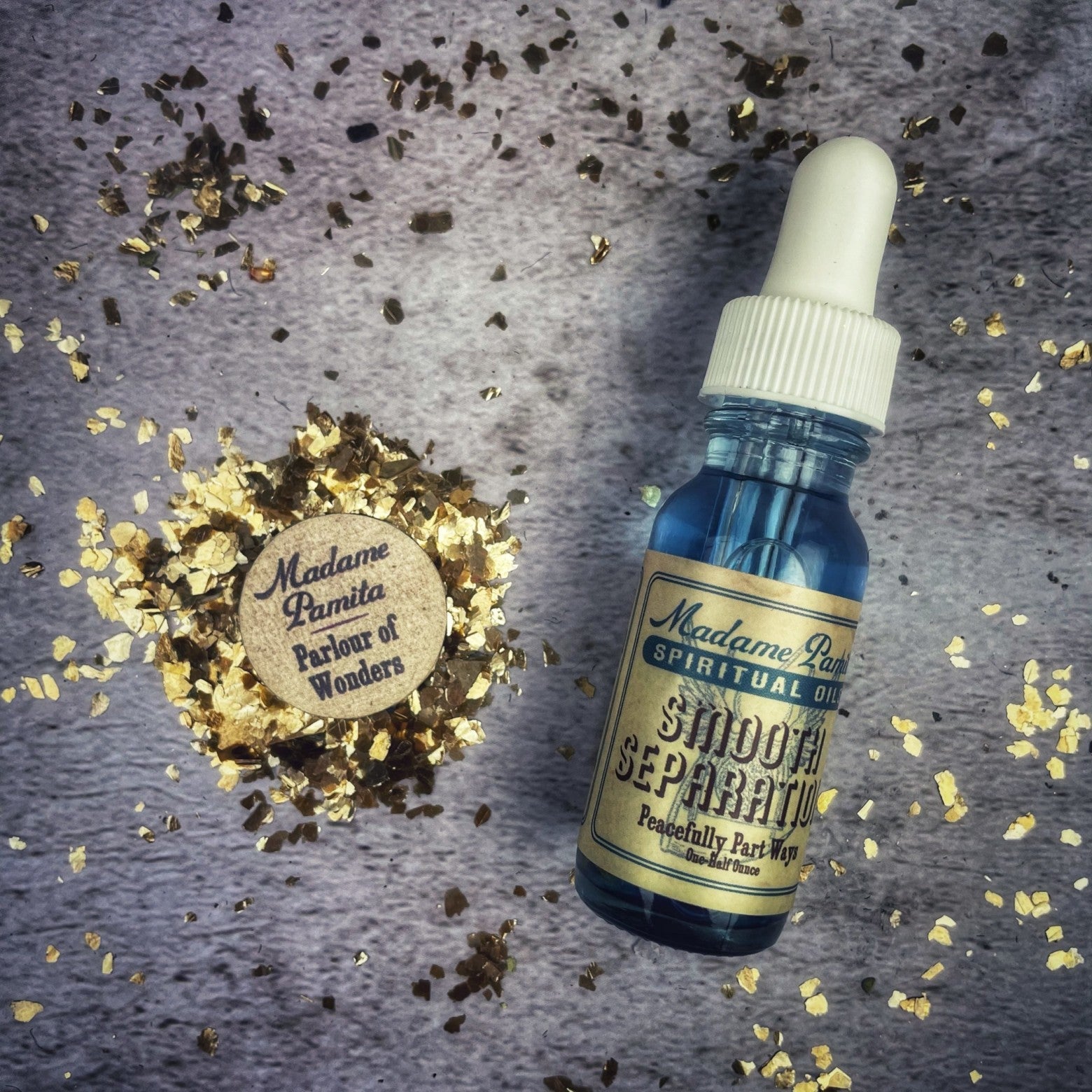 Smooth Separation Oil by Madame Pamita from Parlour of Wonders, featuring a glass bottle with dropper for separation and healing.