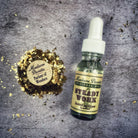 Bottle of Steady Work Oil by Madame Pamita from Parlour of Wonders, with label and dropper cap visible.