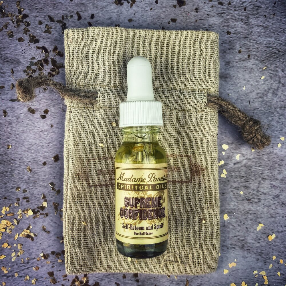 Supreme Confidence Oil by Madame Pamita from Parlour of Wonders, featuring a glass bottle with a dropper and mystical packaging.