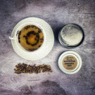 Psychic Eye Potion Spell Kit by Parlour of Wonders featuring a potion tin and moon infuser on a mystical background.
