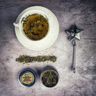 Parlour of Wonders Money Drawing Potion Spell Kit with a metal tin and star-shaped infuser for attracting wealth.