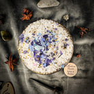 Small jar of Parlour of Wonders Powerful Protection Bath Crystals with colorful crystals inside for soothing bath experience