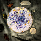 Small jar of Queen Elizabeth Bath Crystals by Parlour of Wonders with purple and white crystals for luxurious bath experience