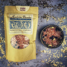Small jar of Parlour of Wonders True Love Bath Crystals with pink and white crystals, perfect for relaxing baths.