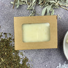 Golden Wealth Prosperity Spell Soap by Parlour of Wonders, handcrafted soap with gold accents and intricate herbal detailing.