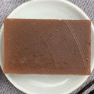 Parlour of Wonders Magnetism Manifesting Spell Soap with dark, mystical design and magical symbols on the soap bar.