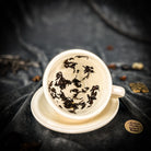 Deluxe Tea Leaf Reading Kit by Parlour of Wonders with tea leaves, reading tools, and instruction guide for tea reading.