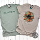 Peace Sunflower short sleeve graphic T-shirt by The Graphic Tee featuring a sunflower and peace sign design.