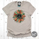 Peace sunflower short sleeve graphic tee from The Graphic Tee, featuring a vibrant sunflower and peace sign design.