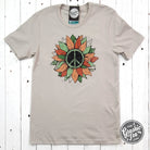 Peace sunflower short sleeve graphic tee from The Graphic Tee, featuring a vibrant sunflower design on soft fabric.