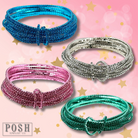 Set of pink stretch bracelets with tiny rhinestones by Pink Panache Brands, featuring blue accents and a flexible, stylish design.