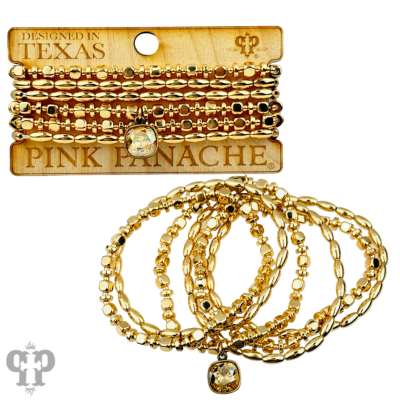 Gold bicone and square bead stacked bracelet by Pink Panache Brands, featuring layered gold-toned jewelry with geometric bead accents.