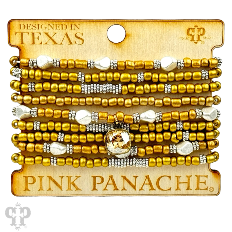 Gold, silver, and white pony bead stacked bracelet from Pink Panache Brands, featuring colorful beaded design and adjustable fit.