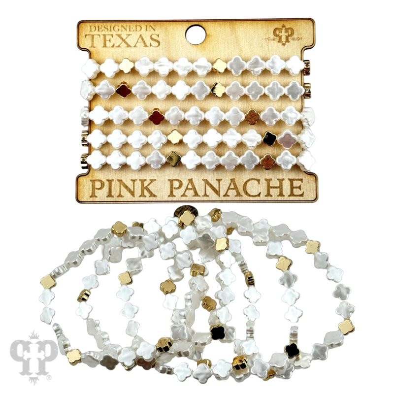 Iridescent pearl clover-shaped bracelet stack featuring gold-tone bracelets by Pink Panache Brands, stylish and elegant jewelry.