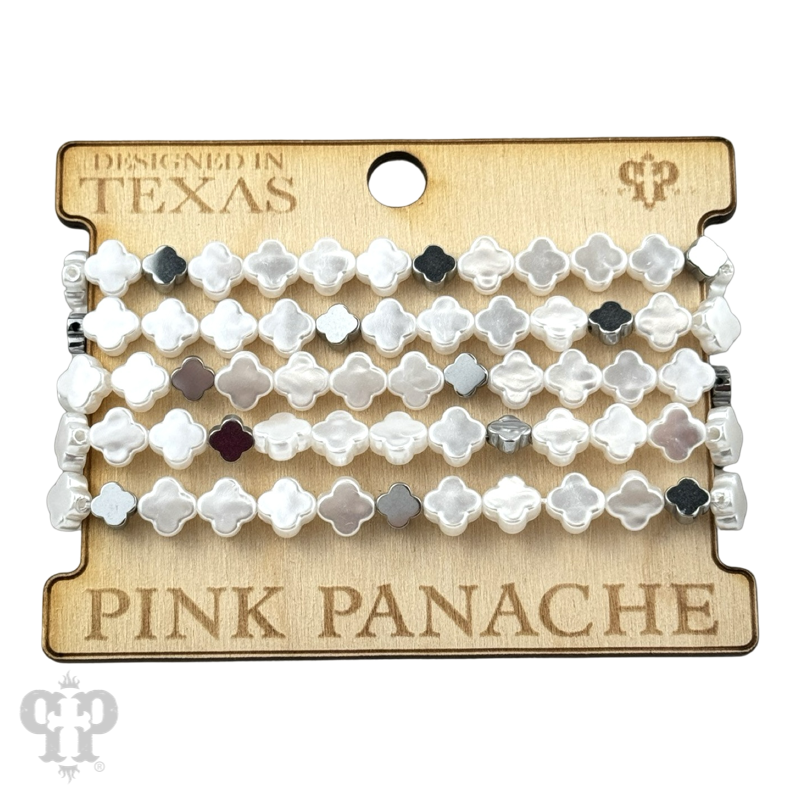 Iridescent pearl clover shape bracelet stack from Pink Panache Brands featuring gold-tone bracelets with shimmering pearls.
