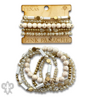 White stone, crystal, and gold bead bracelet from Pink Panache Brands featuring elegant mixed-tone beads and a stylish design.