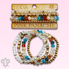 Multi-color and gold bead bracelet from Pink Panache Brands featuring vibrant beads and elegant gold accents.