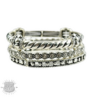 Three-piece rhinestone and silver bracelet set from Pink Panache Brands, featuring sparkling embellishments and elegant designs.