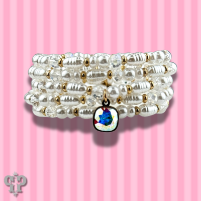Cream pearl bead bracelet stack with Austrian crystals from Pink Panache Brands, featuring elegant white pearl and crystal accents.