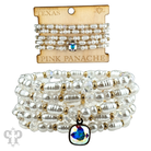 Cream pearl bead bracelet stack with Austrian crystal accents by Pink Panache Brands, featuring elegant, feminine jewelry design.