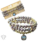 Faceted crystal and gold three-strand beaded bracelet with Austrian crystals, by Pink Panache Brands, showcasing elegant jewelry design.