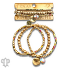 Matte gold and square glass bead bracelet stack with Austrian crystals, stylish jewelry by Pink Panache Brands.