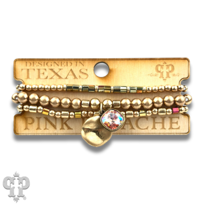 Matte gold and square glass bead bracelet stack with Austrian crystals, stylish jewelry by Pink Panache Brands.