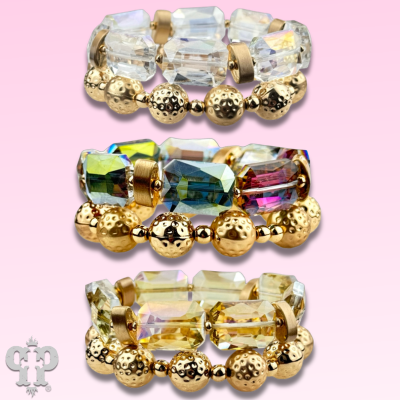 Stack of pink Panache Brands octagon-shaped faceted bead bracelets with white beads, stylish and versatile jewelry accessory.