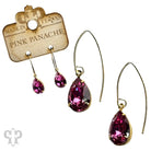 Blue and gold Austrian crystal pear drop earrings by Pink Panache Brands, featuring elegant faceted crystals and a delicate dangle design.