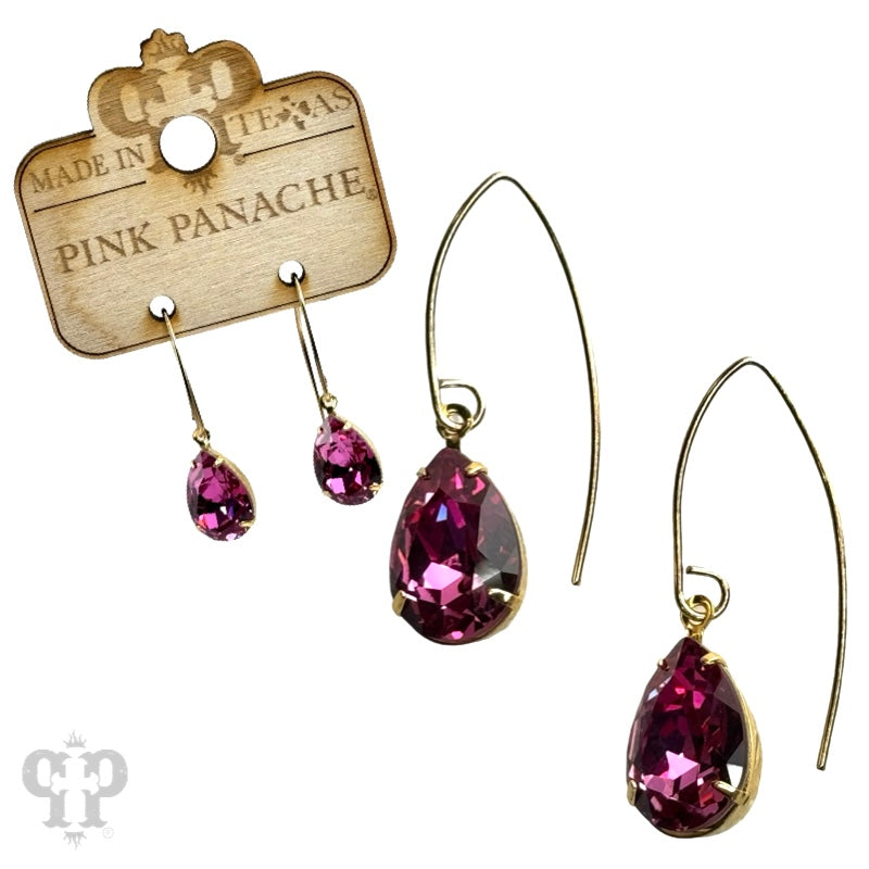 Blue and gold Austrian crystal pear drop earrings by Pink Panache Brands, featuring elegant faceted crystals and a delicate dangle design.