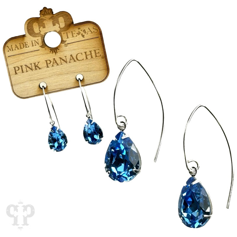 Blue and gold Austrian crystal pear drop earring by Pink Panache Brands featuring elegant crystal accents and a dangling design.