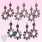 Pink Panache Brands chandelier earrings featuring blue rhinestones, teardrop shape, and Austrian crystal accents.